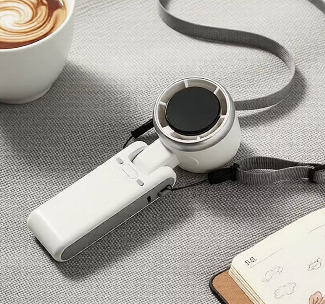 Mini Handheld Electric Turbo Foldable Fan with Adjustable Speeds